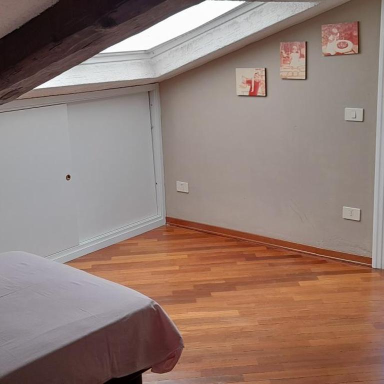 Corte Cavour. Una mansarda nel cuore della città - Two-Bedroom Apartment - 12