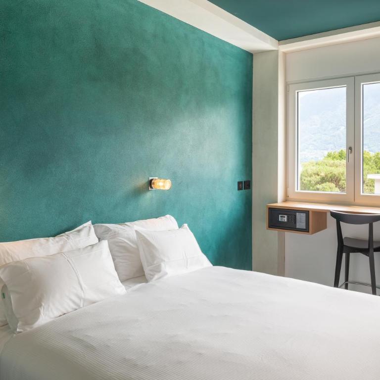 Riva Rooms & Studios - Check-In 24hr - Camera Matrimoniale/Doppia con Letti Singoli con Vista Montagna - 2