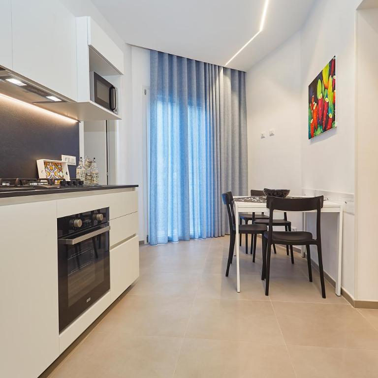 Porta del Golfo Apartments & Suites - Appartamento con 2 Camere da Letto - 1