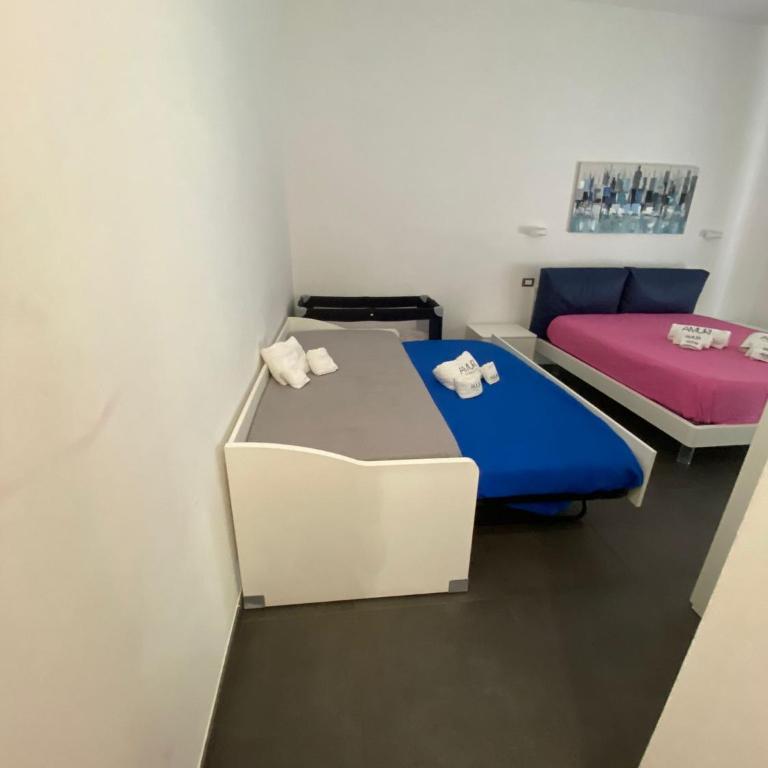 Amuri Room&Suite - Quadruple Room with Balcony - 8