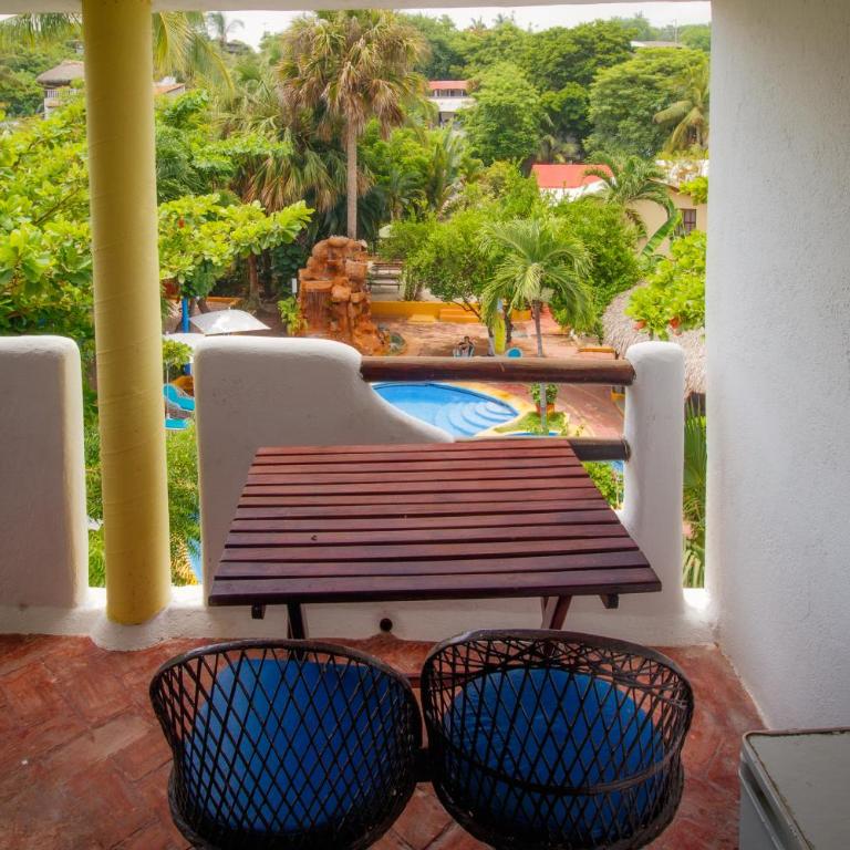 Hotel y Bungalows Acuario - Bungalow con vistas al jardín - 1