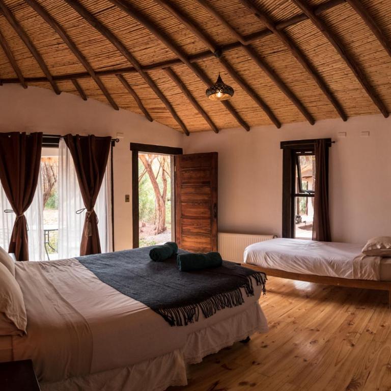 Lodge Atacama Horse - Habitación Triple con vistas al jardín - 1