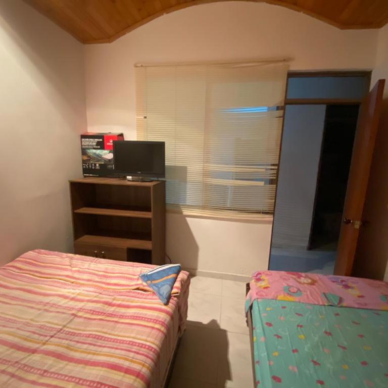 Acogedor y cómoda casa vacacional Condominios Flandes - Casa de 4 dormitorios - 14