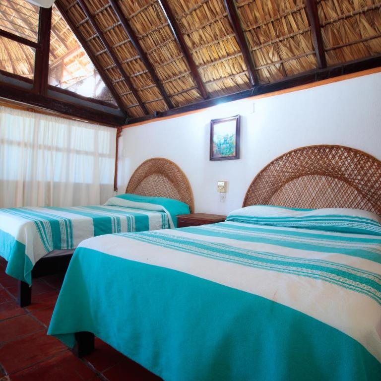 Hotel y Bungalows Acuario - Habitación Deluxe con 2 camas grandes - 6