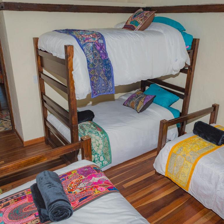 Entre Árboles Hostal - Habitación cuádruple - 1