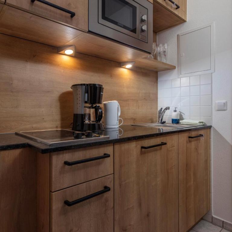 Aparthotel Chiemgaufuchs - CHIEMGAUKARTE - Großes Doppelzimmer - 10