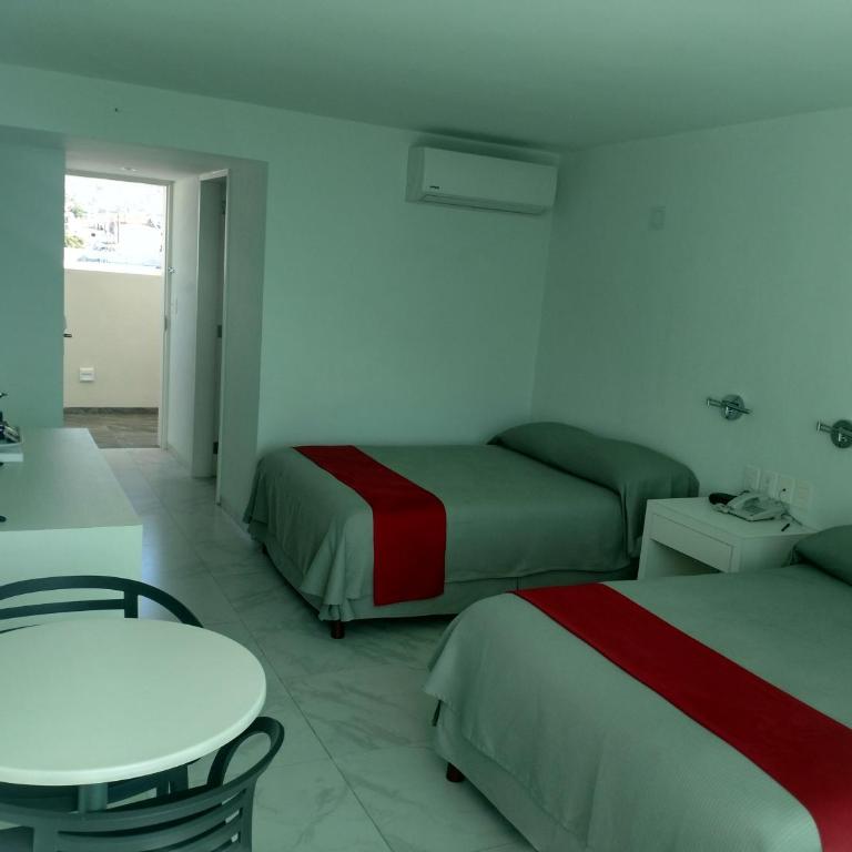 We Hotel Acapulco - Habitación Doble Estándar con 2 camas dobles - 1
