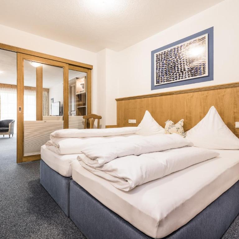Andre Arnold - Boutique Pension - Comfort Doppelzimmer - Südseite - 8