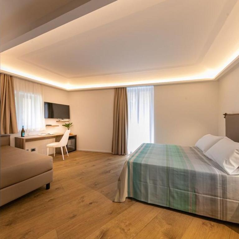 PALAZZO RAHO SUITES - Camera Tripla Deluxe - 1
