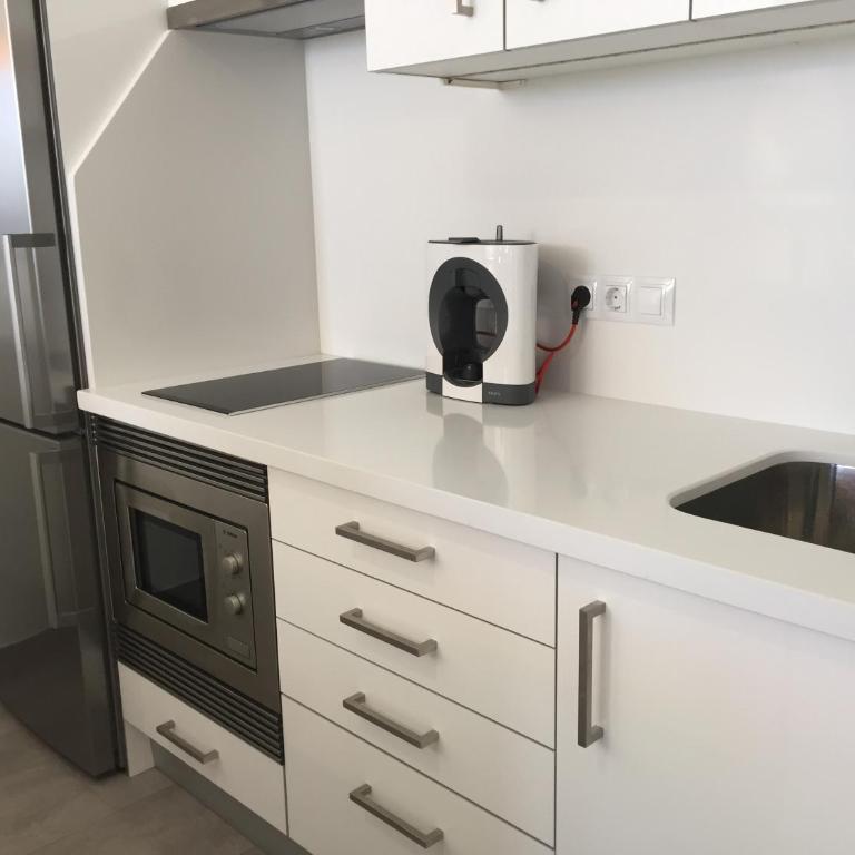 Las Arenas - apartamento moderno con vistas al mar y WiFi veloz de fibra óptica - One-Bedroom Apartment - 38