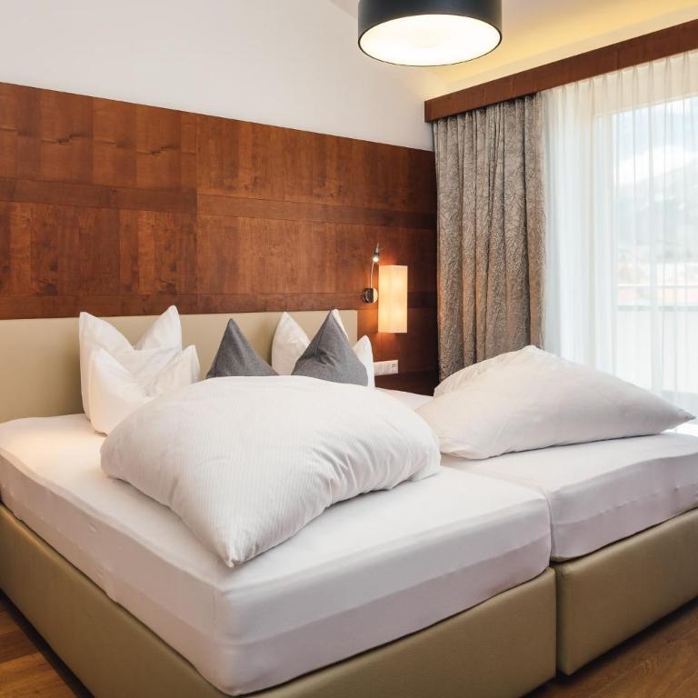 Schneeweiss lifestyle - Apartments - Living - Superior Apartment mit 2 Schlafzimmern und Terrasse - 3