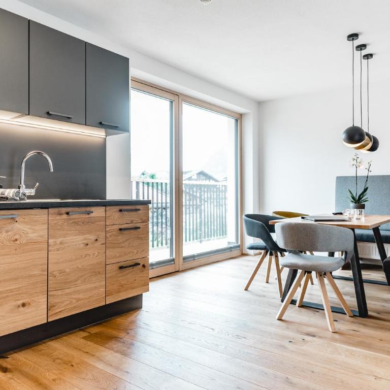Cabin8 Alpine Flair Apartments - Apartment mit Gartenblick - 1