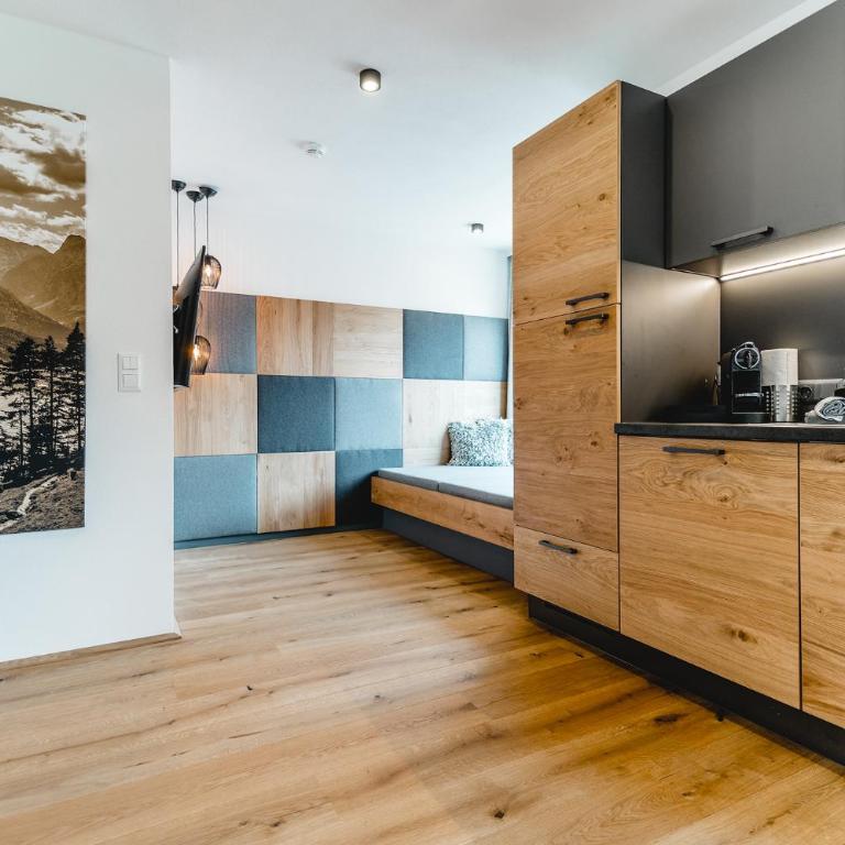 Cabin8 Alpine Flair Apartments - Apartment mit Gartenblick - 11