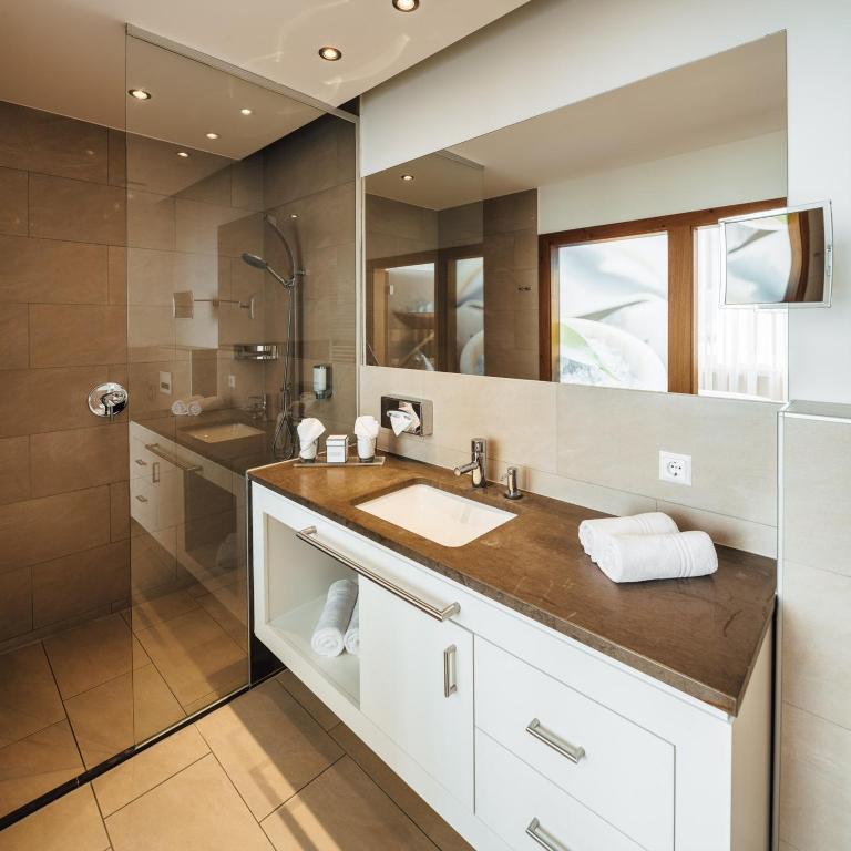 Schneeweiss lifestyle - Apartments - Living - Apartment mit 4 Schlafzimmern und einem Balkon - 8