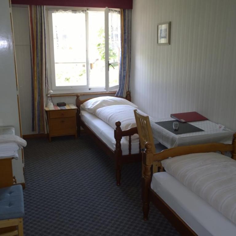 Swiss Lodge Hotel Bernerhof - Zweibettzimmer mit Gemeinschaftsbad - 1