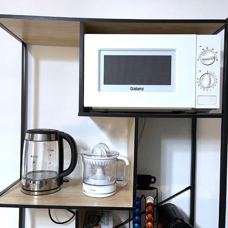 Calvi T2 climatisé, wifi, centre-ville, à proximité plage, commerces, taxi & gare, vue plage & montagne - Appartement 1 Chambre - 29