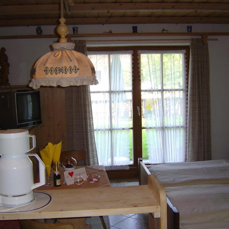 Ferienwohnungen Almbrünnerl - Chiemgau Karte - Apartment mit Gartenblick - 1