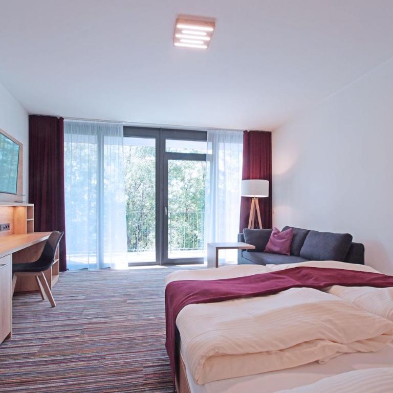Soloplan City Resort - Deluxe Doppelzimmer mit Balkon - 1