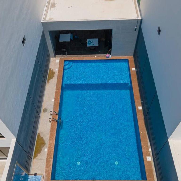 Departamento Atlántico Alberca y Casa Club - Two-Bedroom Apartment - 14