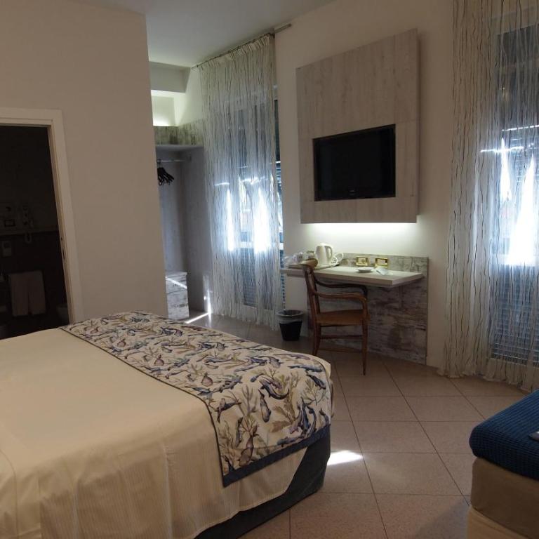 Piccolo Hotel - Camera Tripla Deluxe - 5