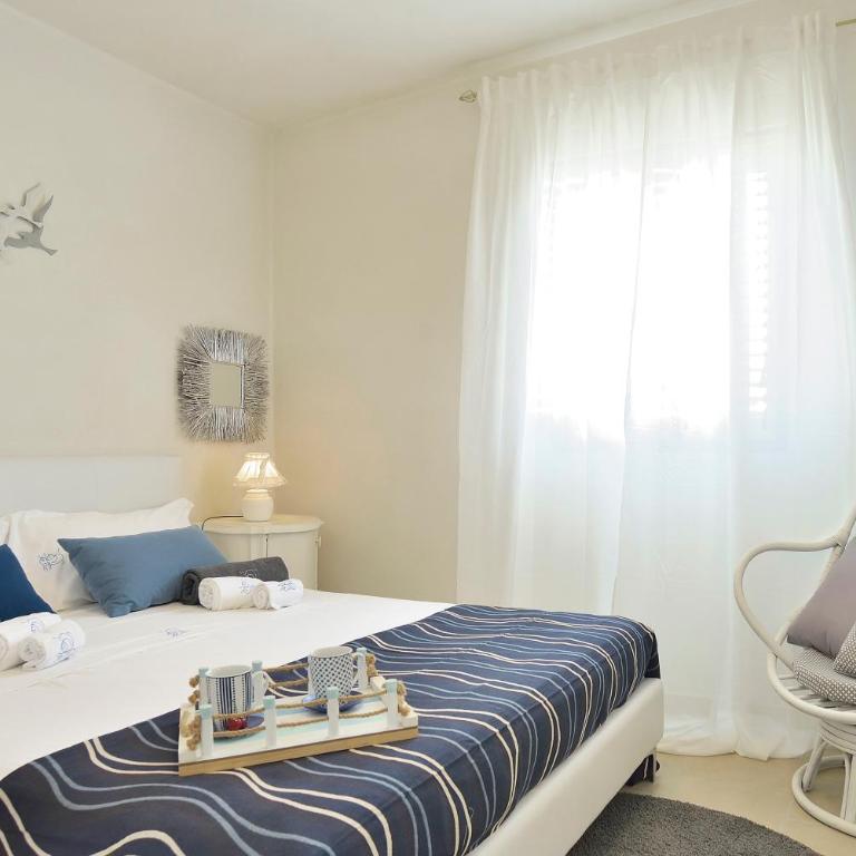 CASA con ACCESSO AL MARE - Apartment - 77