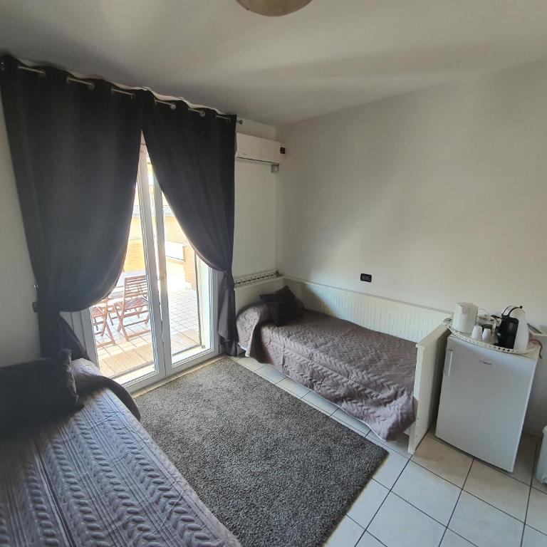 Guest House Brezza Marina - Camera Quadrupla Deluxe - 10