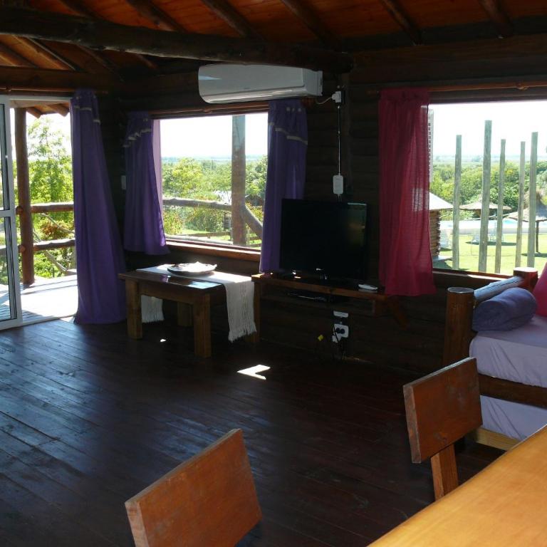 Cabañas de la Ribera - Habitación Cuádruple - vistas al jardín - 1