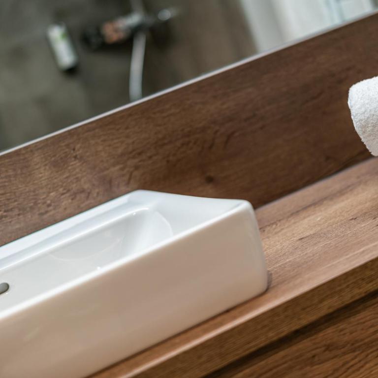 Rufi's Hotel Innsbruck - Doppel- oder Zweibettzimmer - 11