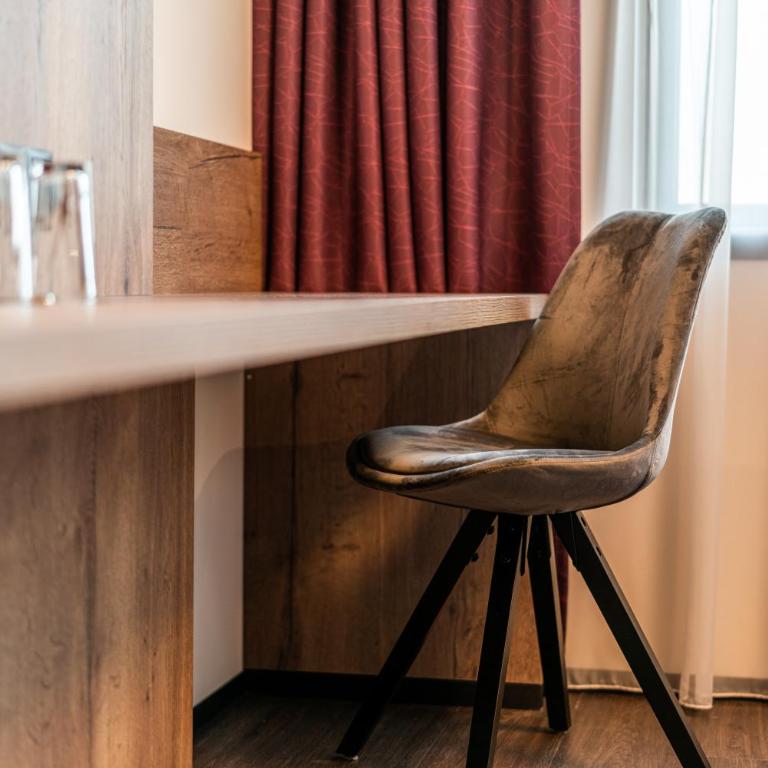 Rufi's Hotel Innsbruck - Doppel- oder Zweibettzimmer - 10