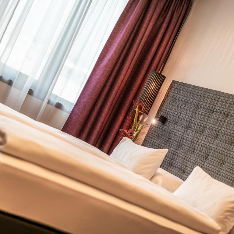 Rufi's Hotel Innsbruck - Doppel- oder Zweibettzimmer - 6