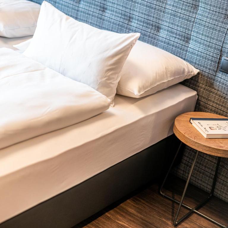 Rufi's Hotel Innsbruck - Doppel- oder Zweibettzimmer - 8