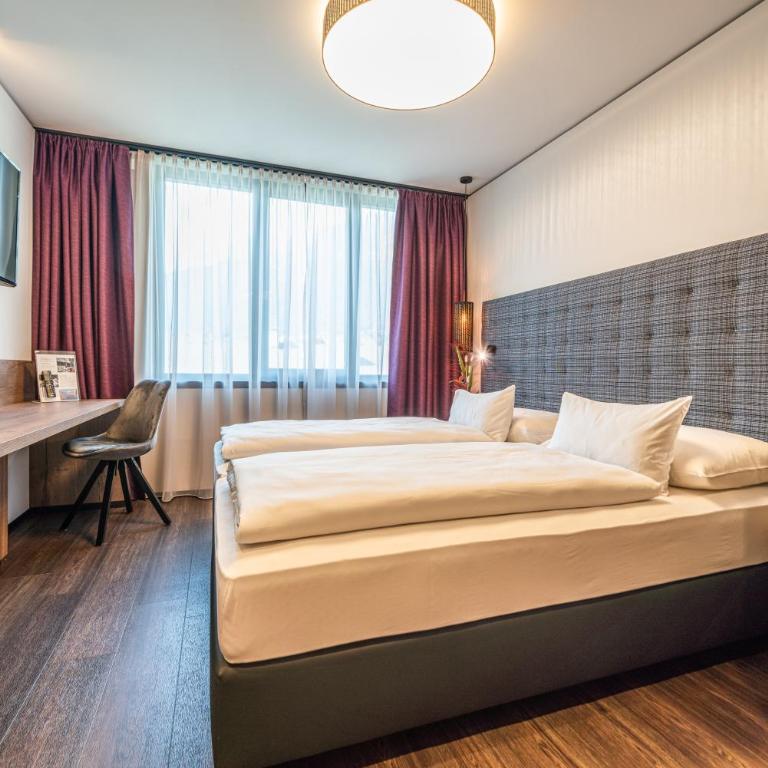 Rufi's Hotel Innsbruck - Doppel- oder Zweibettzimmer - 2