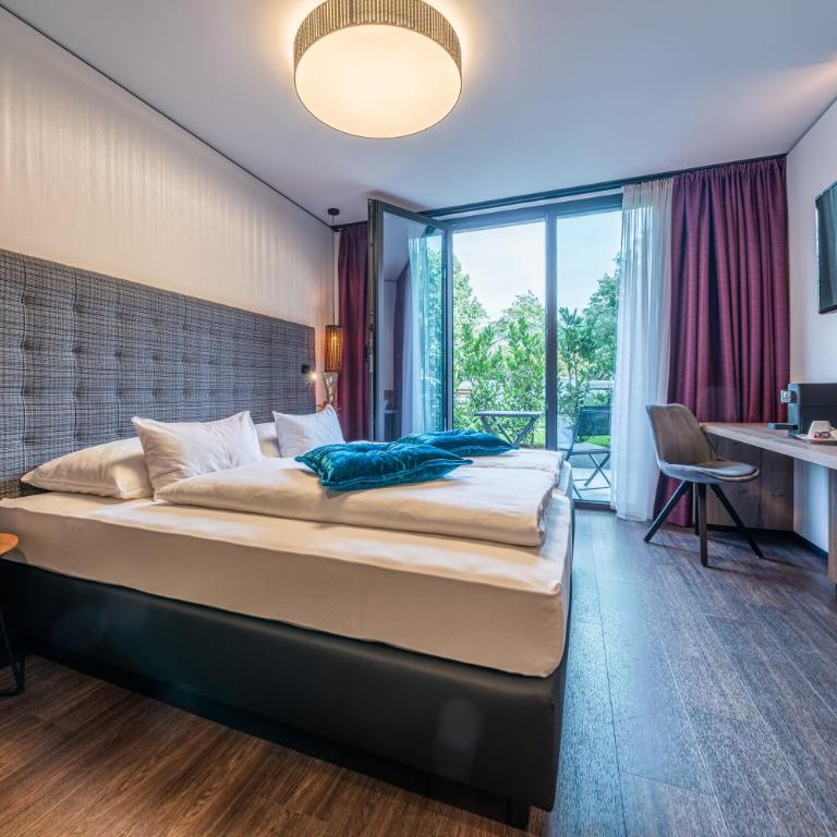 Rufi's Hotel Innsbruck - Doppelzimmer mit Terrasse - 11