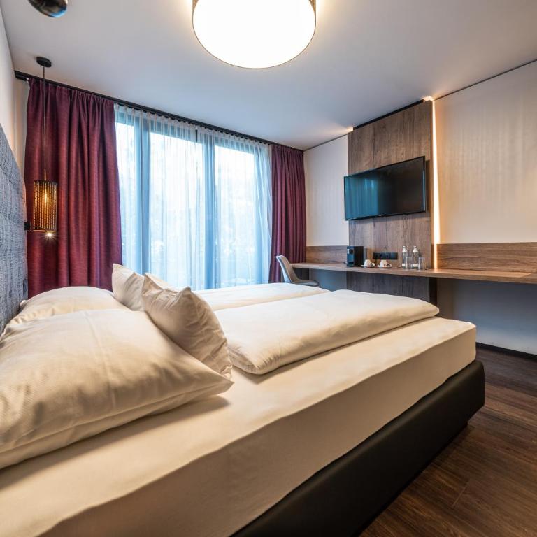 Rufi's Hotel Innsbruck - Doppelzimmer mit Terrasse - 8