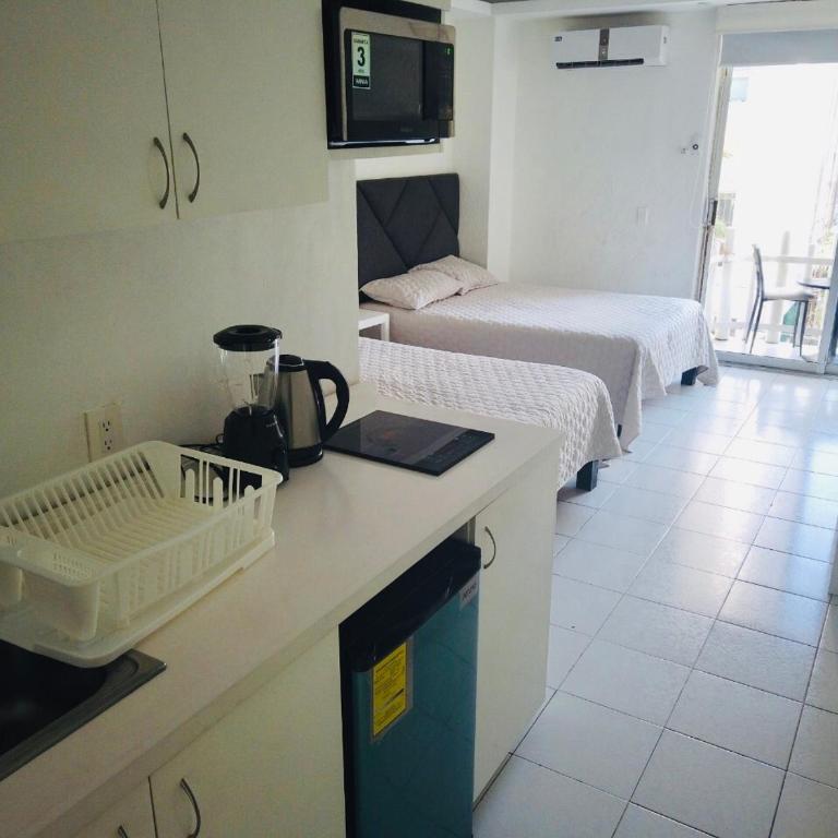 Acapulco suites Y condominio Mediterrane - Habitación Doble - 2 camas dobles - 5