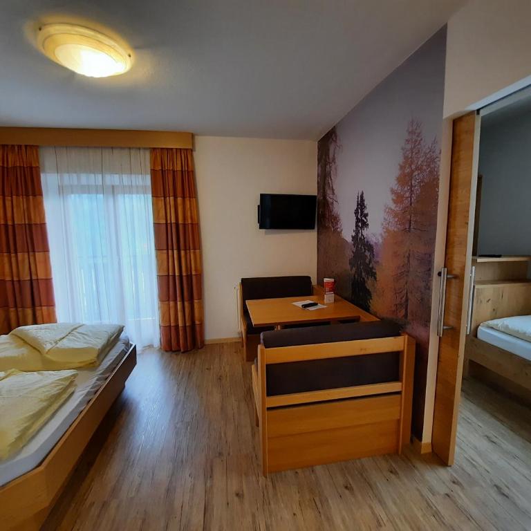 Hotel Pension Sonnegg - Junior Suite mit Balkon - 1