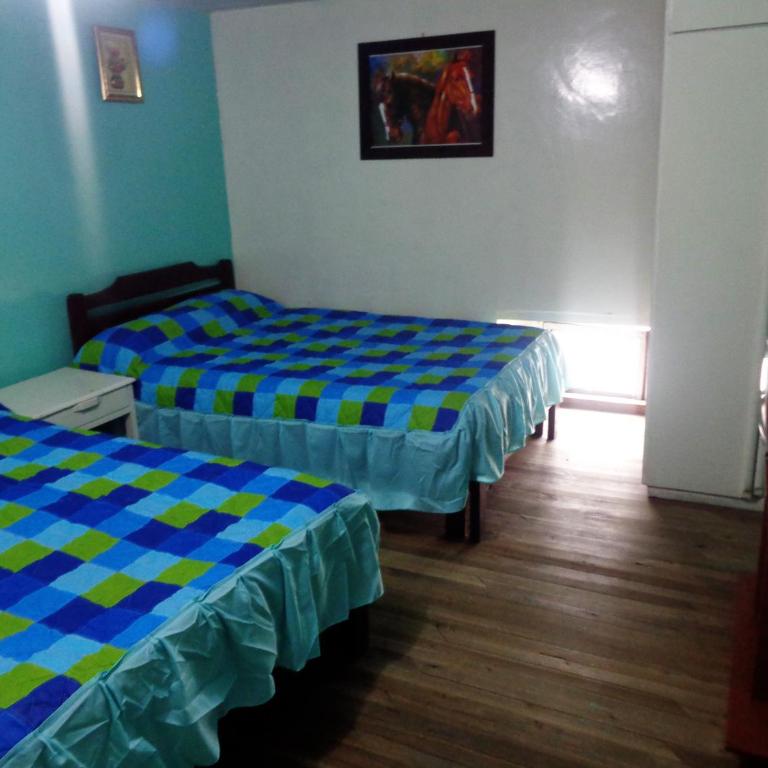 Hostal Yumbo Imperial - Habitación Doble con baño privado - 2 camas - 2