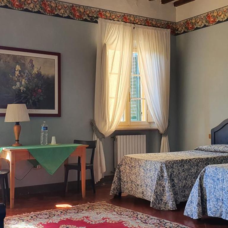 Soggiorno Dimora Del Grifo - Camera Quadrupla con Bagno in Comune - 12