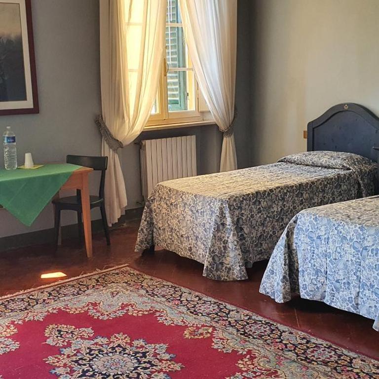 Soggiorno Dimora Del Grifo - Camera Quadrupla con Bagno in Comune - 13