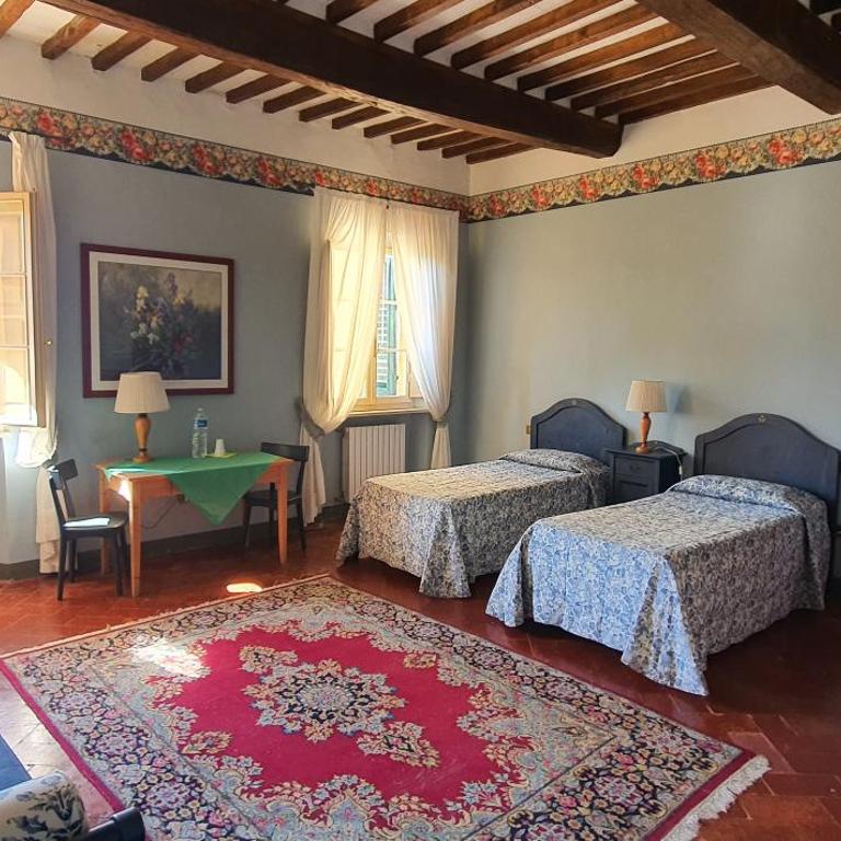 Soggiorno Dimora Del Grifo - Camera Quadrupla con Bagno in Comune - 14