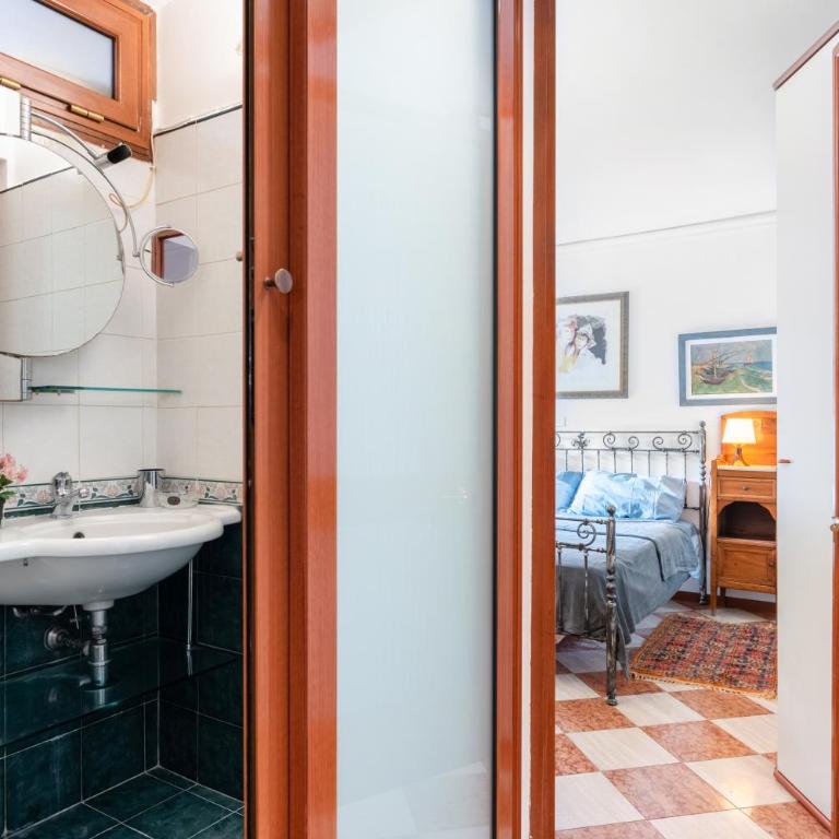 GuestHost - Via Etnea Cozy Apartment with Balcony - Appartamento con 1 Camera da Letto - 11