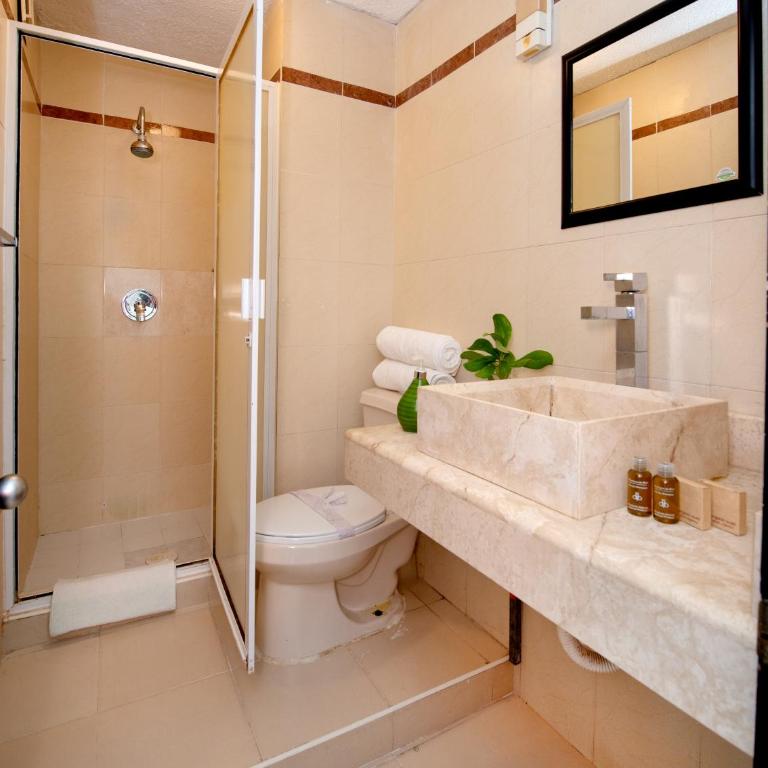 Oceanfront white sand beach condo for families - Two-Bedroom Apartment - 13