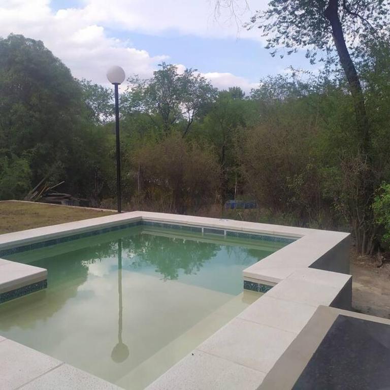 Casa con pileta y quincho en sierras chicas - Casa Unifamiliar de 3 dormitorios - 18