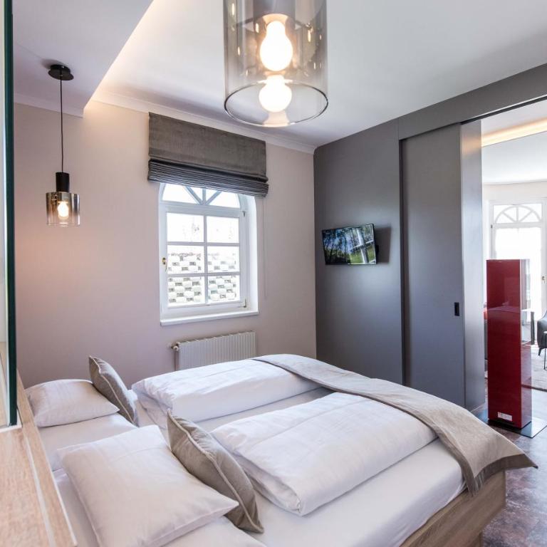 Lust und Laune Hotel am Wörthersee - Suite mit Seeblick und Balkon oder Terrasse - 8