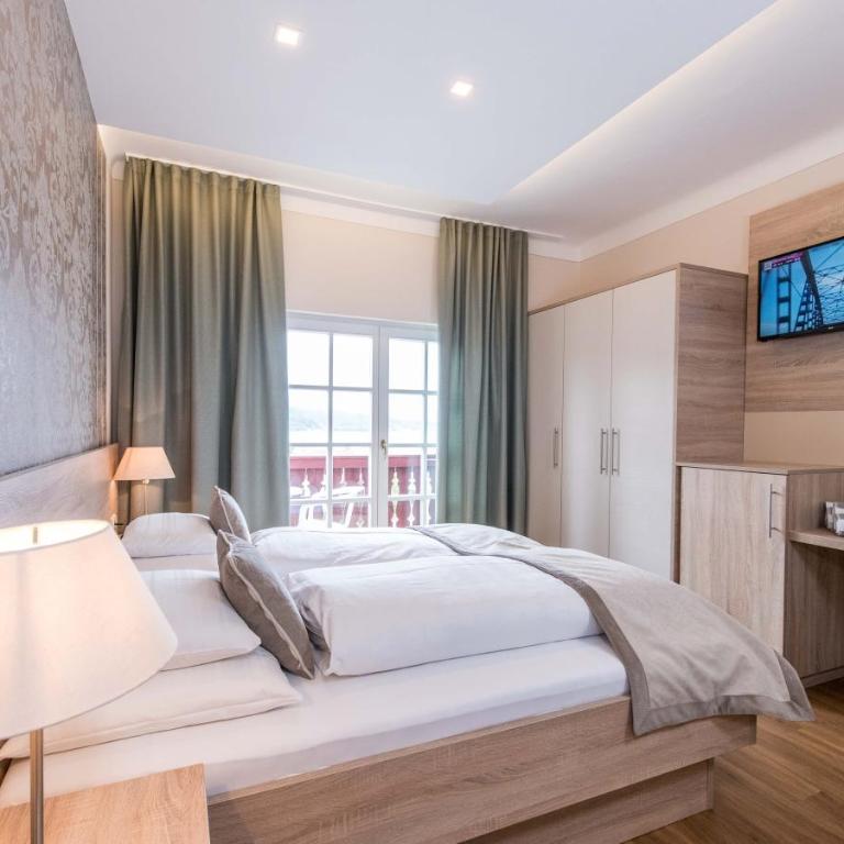 Lust und Laune Hotel am Wörthersee - Kleines Doppelzimmer mit einem Balkon und Seeblick - 2