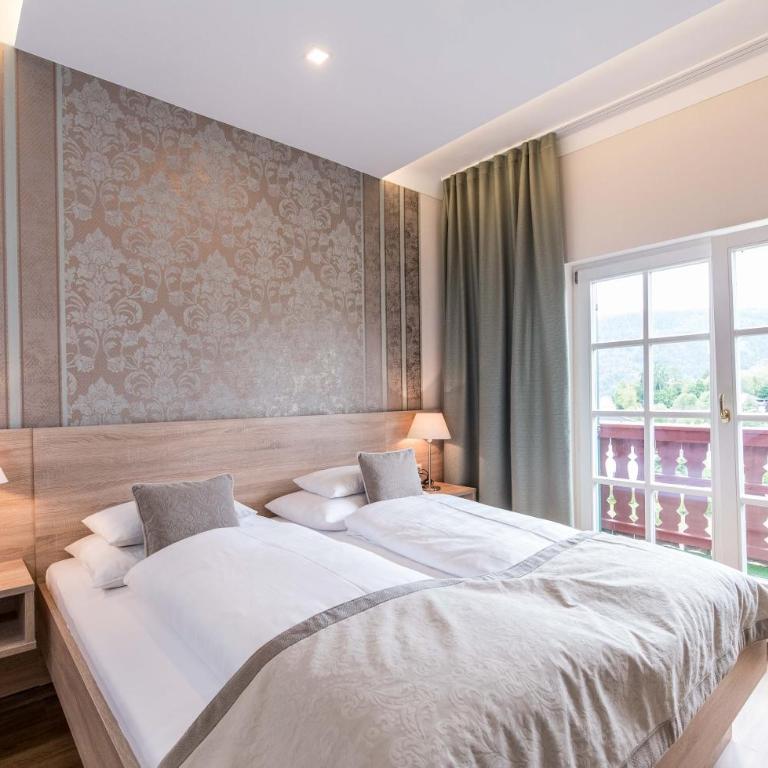 Lust und Laune Hotel am Wörthersee - Kleines Doppelzimmer mit einem Balkon und Seeblick - 1