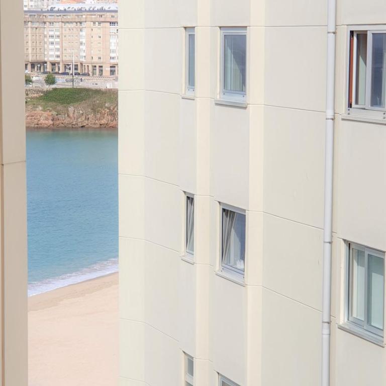 ATICO PLAYA ORZAN CENTRO GARAJE gratis MISMO EDIFICI0 - Apartamento de 2 dormitorios - 7