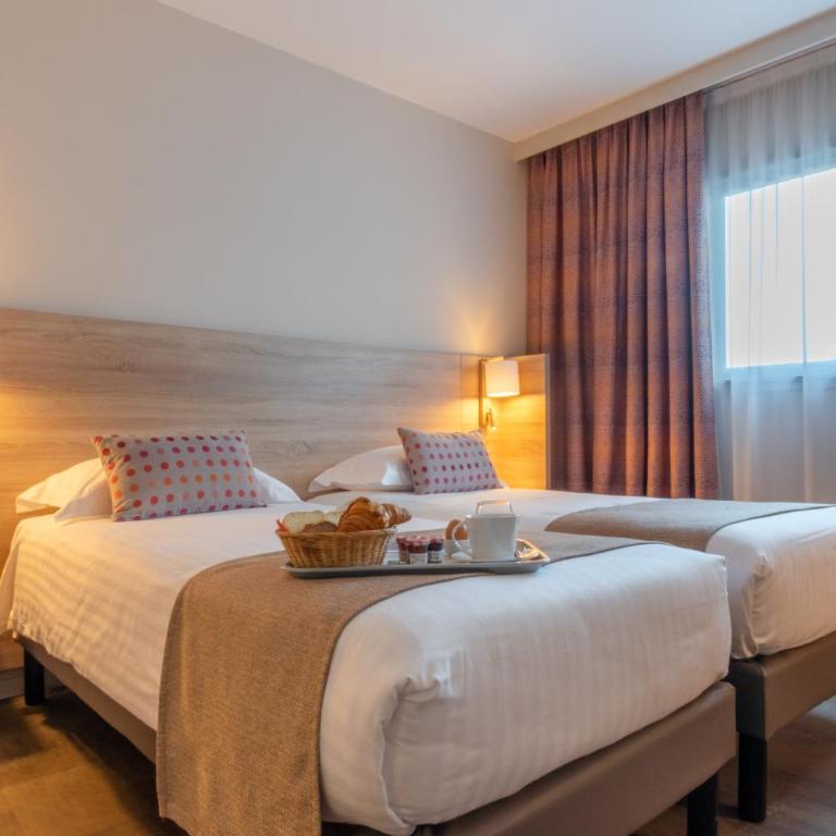 Hôtel L'Empreinte - Chambre Lits Jumeaux - 11