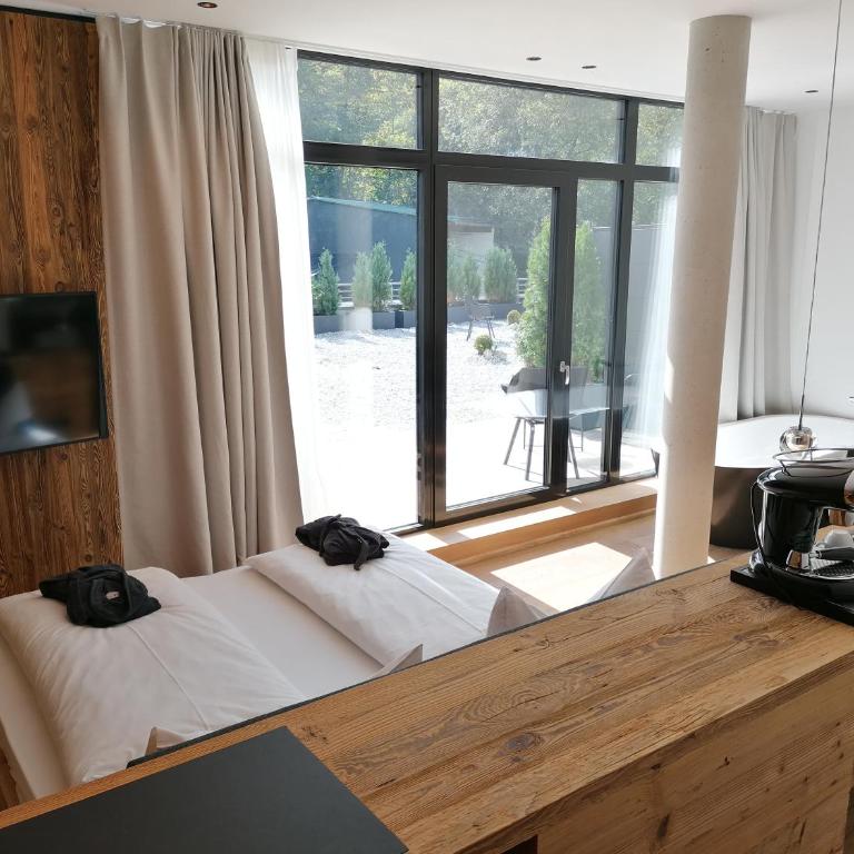 Das Graseck - mountain hideaway & health care - Zimmer Spa Nest mit eigener Sauna und Sonnenterrasse mit Panoramablick - 3