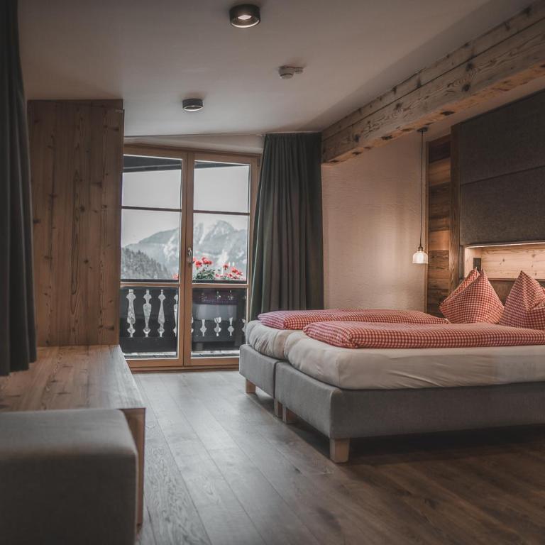 Spielberghaus - Doppelzimmer mit Balkon - 1